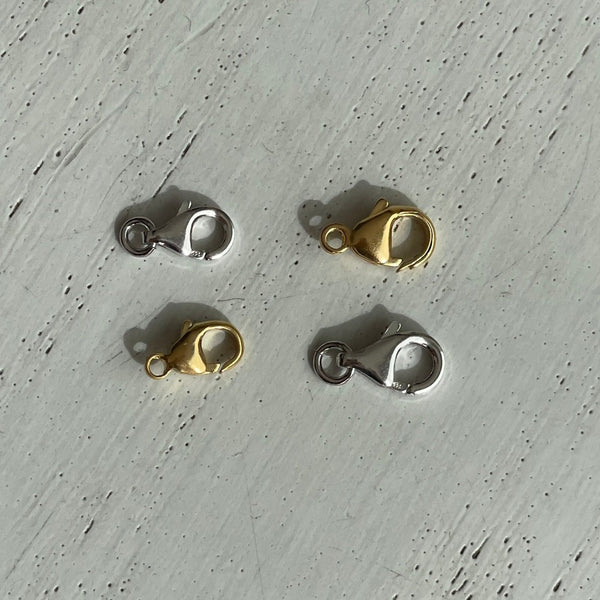 verguld en zilveren karabijnslot in 11 en 13 mm