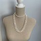 Lange collier met witte barokke zoetwaterparels optie 2