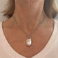 Collier van labradoriet met barokparel